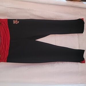 A pair of WI Badger active capris
